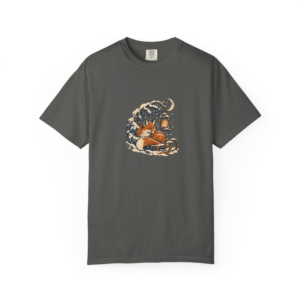 Pepper Comfort Colors 1717 t-shirt with a fox curled beside a lantern on a snowy pine branch, folk screenprint-style graphic
