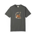 Pepper Comfort Colors 1717 t-shirt with a fox curled beside a lantern on a snowy pine branch, folk screenprint-style graphic