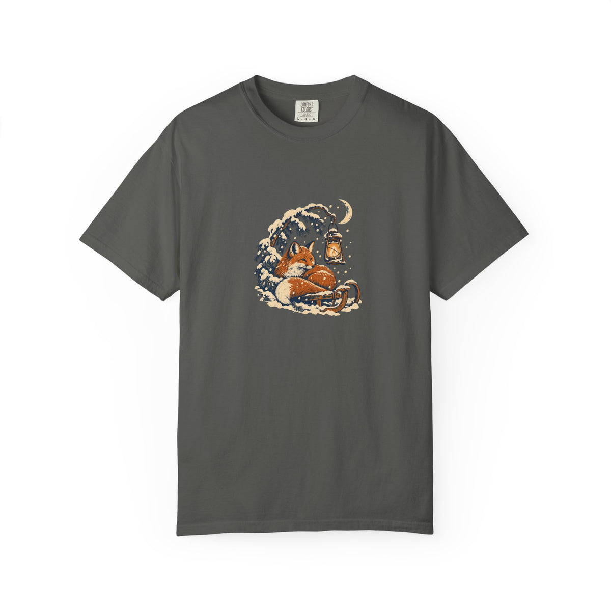 Pepper Comfort Colors 1717 t-shirt with a fox curled beside a lantern on a snowy pine branch, folk screenprint-style graphic