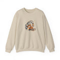 Sand Gildan 18000 crewneck sweatshirt with a fox curled beside a lantern on a snowy pine branch, folk screenprint-style graphic