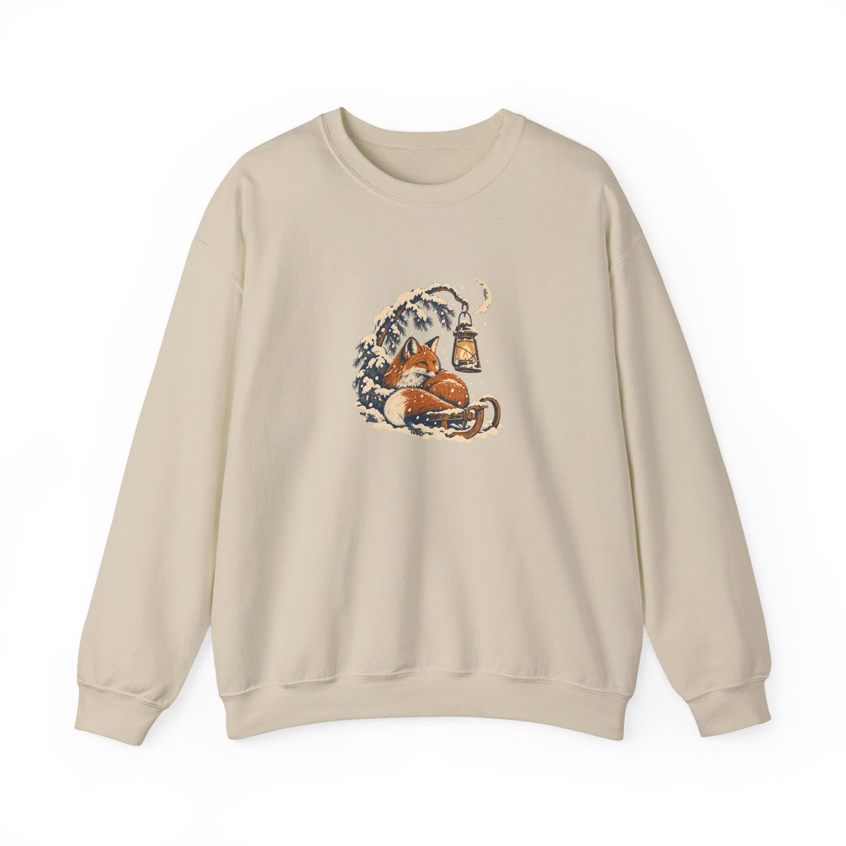 Sand Gildan 18000 crewneck sweatshirt with a fox curled beside a lantern on a snowy pine branch, folk screenprint-style graphic