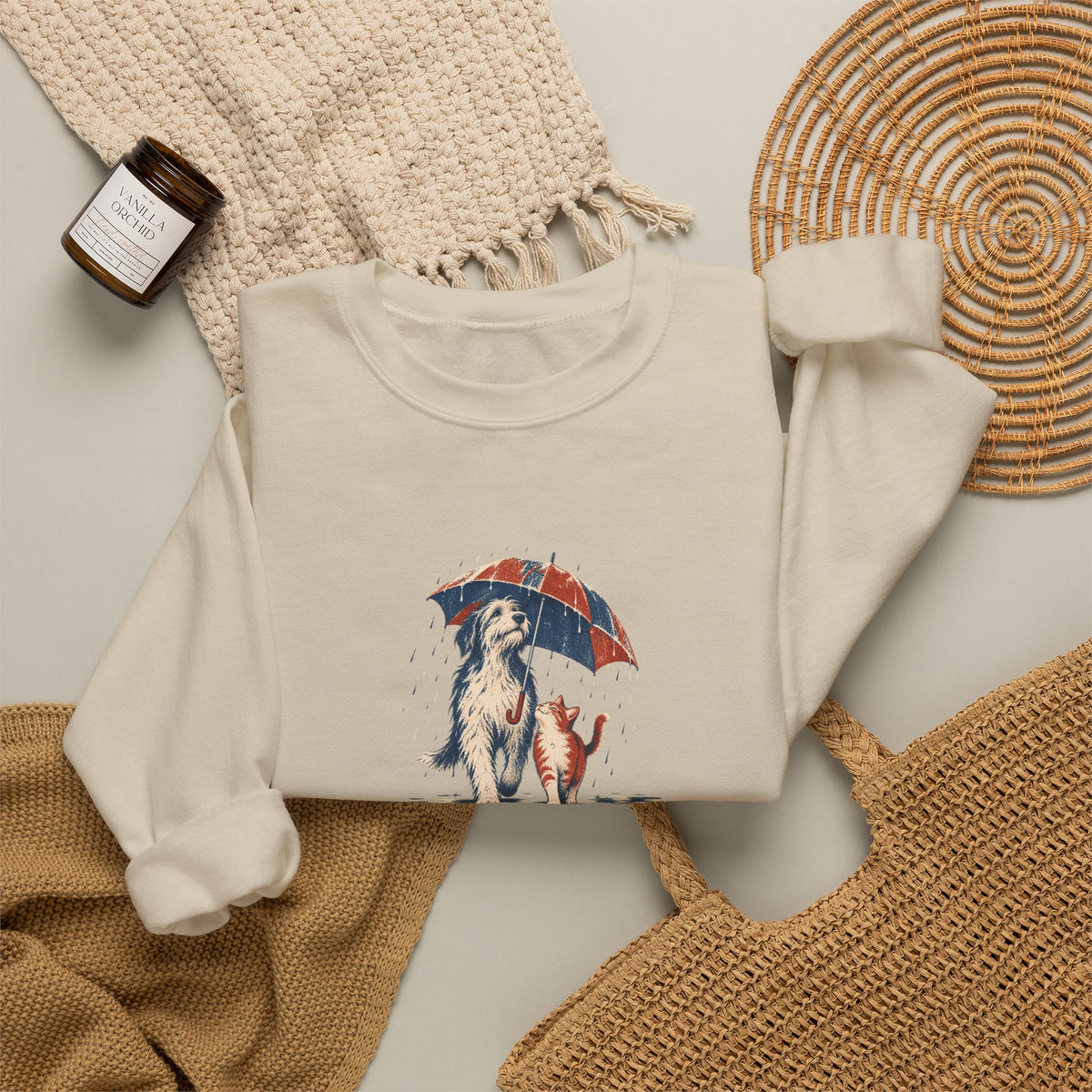 Dog and Cat Under One Umbrella Graphic Crewneck Sweatshirt | Gildan Sand